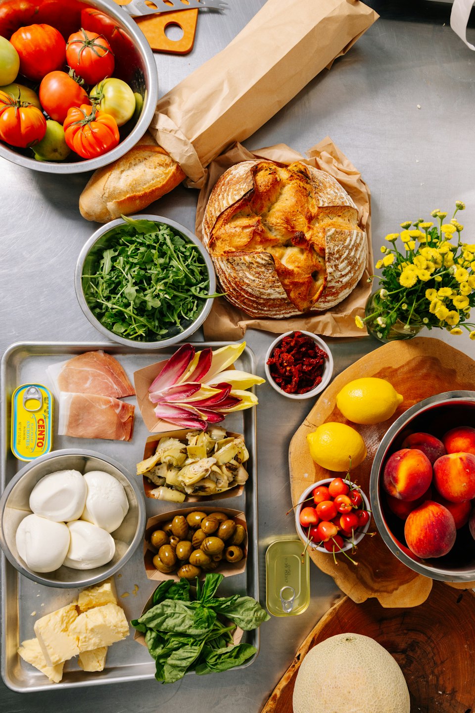 Fresh ingredients for a gourmet meal laid out on a countertop.